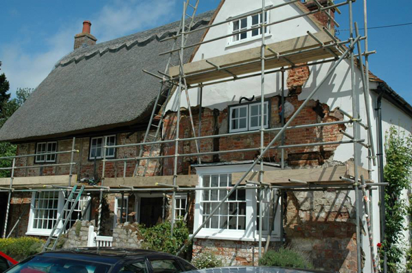 Plough with scaffolding